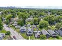 This is a great view of homes in a lush residential neighborhood, with the city skyline in the distance at 3636 Crescent Ave, Indianapolis, IN 46208
