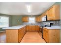 Spacious kitchen with stainless steel appliances and ample counter space at 5240 Ochs Ave, Indianapolis, IN 46254
