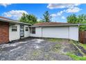 Spacious attached garage with ample parking space and convenient access to the home at 5349 Culver St, Indianapolis, IN 46226