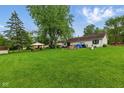 Expansive backyard featuring lush greenery and a charming gazebo, perfect for outdoor enjoyment at 9130 E 18Th St, Indianapolis, IN 46229