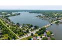 Stunning aerial view of a lakeside community with lush greenery and access to beautiful waterways at 101 Edgewater Dr, Noblesville, IN 46062