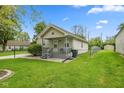 Charming single-Gathering home with a fenced yard and a well-maintained lawn at 2414 N Blaine St, Muncie, IN 47303