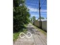 Street view with trees and telephone pole at 2421 N Arsenal Ave, Indianapolis, IN 46218