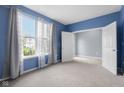Bedroom featuring a neutral color palette and plenty of natural light at 2502 Creekland Dr, Columbus, IN 47201