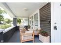 Inviting front porch with comfortable seating, perfect for relaxing outdoors at 4325 Norwaldo Ave, Indianapolis, IN 46205