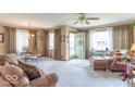 Bright living room with open layout featuring dining area and comfortable seating at 445 N 13Th Ave, Beech Grove, IN 46107