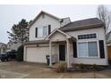 Two story home with neutral siding, two car garage and black shutters at 708 Mountain Pine Dr, Greenwood, IN 46143