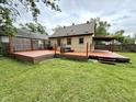 Expansive backyard with a spacious deck, perfect for outdoor entertaining and relaxation at 710 Bacon St, Indianapolis, IN 46227