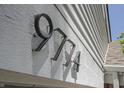 Modern and bold black house numbers on white siding, 9774 at 9774 Foxboro Ln, Fishers, IN 46038