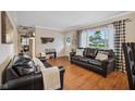 Comfortable living room with wood floors, and ample natural light at 1240 Hamilton Dr, Noblesville, IN 46060