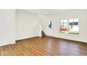 Bright and airy living room with hardwood floors and plenty of natural light at 19450 Northwest Dr, Westfield, IN 46074