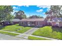 Aerial view showcases the home's well-kept lawn and proximity to neighboring houses at 2538 Sickle Rd, Indianapolis, IN 46219