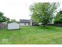 Spacious backyard with a storage shed and a wooden deck at 444 Austin Dr, Avon, IN 46123