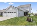 Attached two-car garage provides ample parking and convenient access to the home at 2223 Ryder Pl, Westfield, IN 46074