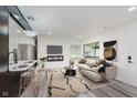 Bright living room with modern furnishings, neutral tones, and stylish decor at 233 N Devon Ave, Indianapolis, IN 46219