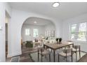 Spacious living room with modern furniture and dining area at 2531 E Brookside Ave, Indianapolis, IN 46218