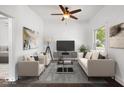 Bright living room with neutral tones, comfortable seating, and modern decor at 301 S Main St, Whitestown, IN 46075