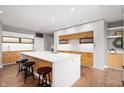 Modern kitchen featuring an island, white countertops, and stainless steel appliances at 435 Virginia Ave # 101, Indianapolis, IN 46203