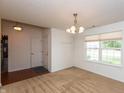 Bright entryway featuring fresh paint, neutral carpet, and a window offering natural light at 6369 Clary Ln, Greenwood, IN 46143