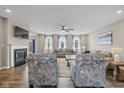 Cozy living room boasts a fireplace and plush seating, perfect for relaxing at 6923 Bryant Pl, Plainfield, IN 46168