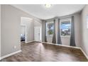 Inviting living room with hardwood floors and bright natural light at 6923 Bryant Pl, Plainfield, IN 46168