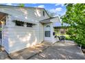 Exterior view of home showcasing the porch and entrance at 1868 N Hawthorne Ln, Indianapolis, IN 46218