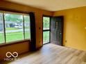 Inviting entryway showcasing natural light, and a secure front door at 1998 Crescent St, Franklin, IN 46131