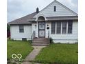 Charming single-story home featuring a well-maintained lawn and inviting front porch at 341 Barton Ave, Indianapolis, IN 46241