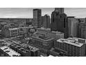 Black and white aerial of downtown with city skyline, buildings with select color windows at 350 N Meridian St # 705, Indianapolis, IN 46204