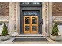 Elaborate bronze, stone, and wood entrance to the Indianapolis Athletic Club at 350 N Meridian St # 705, Indianapolis, IN 46204