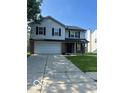 Two-story home with a two-car garage and traditional design at 7549 Stockard St, Indianapolis, IN 46239