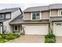 Charming home featuring a well-manicured lawn and an attached two-car garage at 2949 River Bay N Dr, Indianapolis, IN 46240