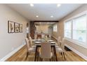 Chic dining area boasting modern decor and plenty of seating for Gathering and guests at 3822 Spann Ave, Indianapolis, IN 46203