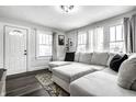 Bright living room with a comfortable sectional sofa and plenty of natural light at 4926 Crittenden Ave, Indianapolis, IN 46205