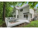 Enjoy outdoor living on this spacious deck with views of the lush green yard and mature trees at 7138 Nile Ridge Ct, Indianapolis, IN 46236