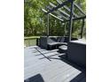 Enjoy outdoor living on this deck with a pergola, perfect for relaxing or entertaining at 8075 Cardinal E Cv, Indianapolis, IN 46256
