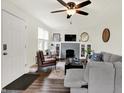 Inviting living area boasting stylish decor and comfortable seating around a cozy fireplace at 907 N Arlington Ave, Indianapolis, IN 46219
