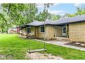 Charming brick home with a swing and a 