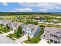 An aerial view showcasing a neighborhood park near the home at 12672 Amber Star Dr, Noblesville, IN 46060