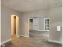 Open-concept living room with light-colored walls and modern flooring at 1624 E 30Th St, Indianapolis, IN 46218