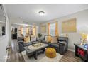 Cozy living room with comfortable seating, modern decor and lots of natural light at 1907 N Drexel Ave, Indianapolis, IN 46218