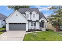 Charming two-story home with well-maintained lawn, updated windows and inviting curb appeal at 241 Chamberlain Cir, Noblesville, IN 46062