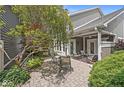 Beautifully landscaped patio with seating area, perfect for outdoor relaxation at 3535 Clearwater Cir, Indianapolis, IN 46240