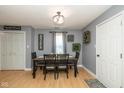 Charming dining room with a table, seating for six, and natural light at 1135 W Wildflower Ct, Mooresville, IN 46158