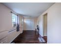 Cozy living room featuring hardwood floors, white trim, and natural light at 2358 Hovey St, Indianapolis, IN 46218