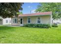 A single-story house featuring tidy landscaping and a well-maintained lawn at 3427 Donald Ave, Indianapolis, IN 46224