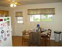Bright kitchen and breakfast nook with laminate floors at 80 Brentwood Dr, Mooresville, IN 46158