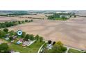 Aerial view of homes surrounded by farmland at 1891 W 300 N, Anderson, IN 46011