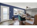 Inviting living room with large windows, stylish furnishings, and modern decor at 634 Park Dr, Greenwood, IN 46143