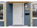 Close up of the new front door with clean lines and modern hardware at 2315 Spann Ave, Indianapolis, IN 46203